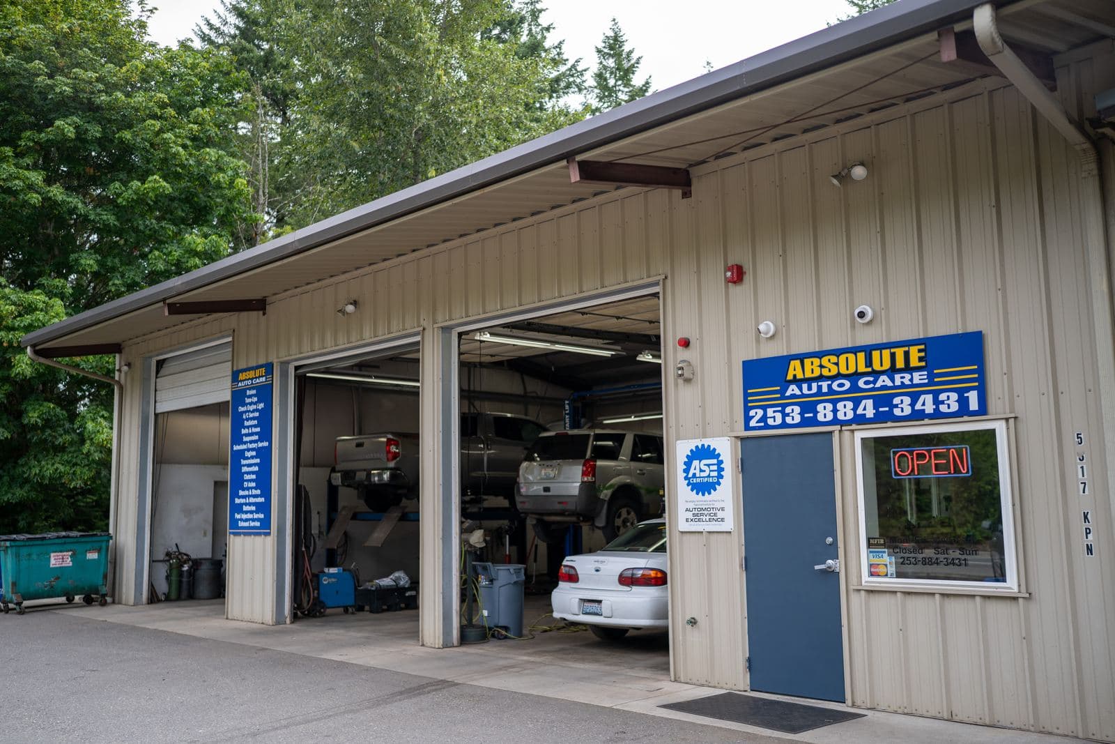 Exterior of the Absolute Auto Care shop on Key Peninsula Hwy in Gig Harbor, WA