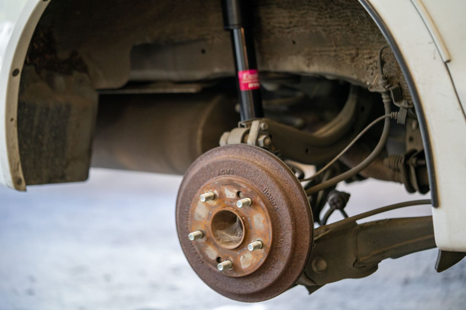 Rear brake drum and hub on a lifted vehicle