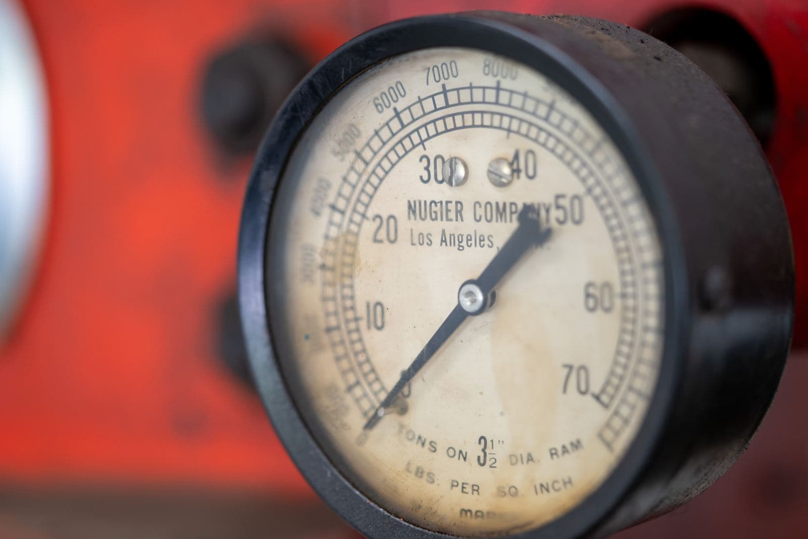 Analog pressure gauge on shop equipment